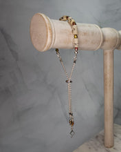 Load image into Gallery viewer, Sheet Music Slider Knot Paper Bead Bracelet w/ pink/green glass spacer beads &amp; silver music note charm
