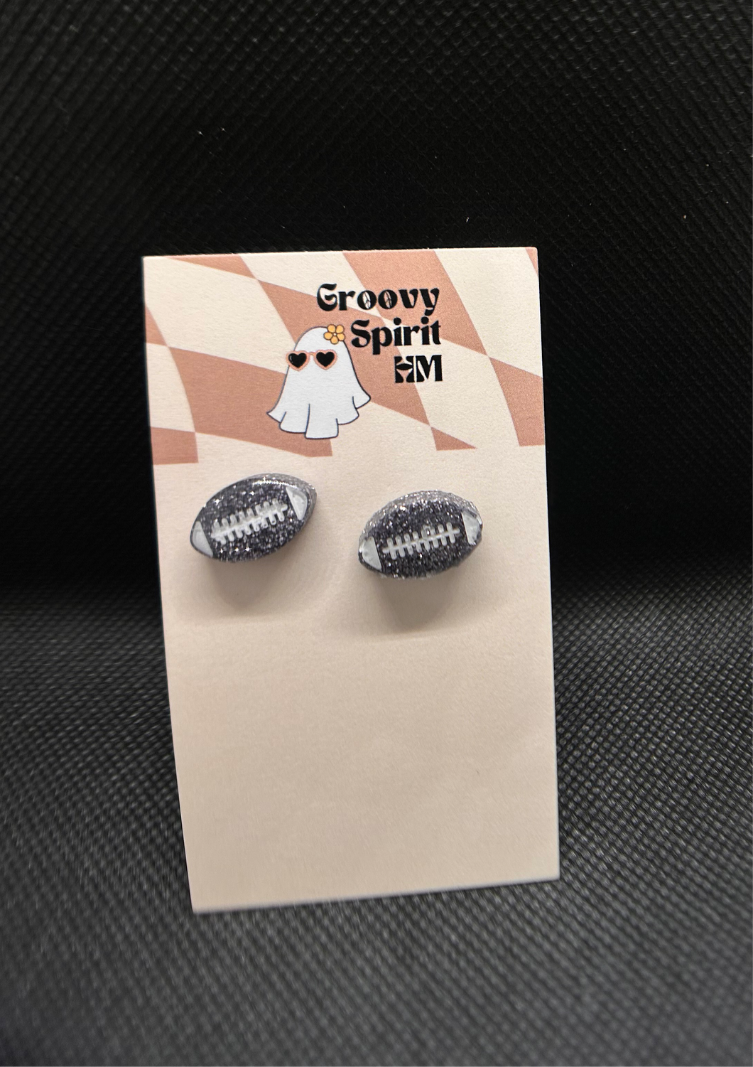 Raiders gunmetal glitter football stud earrings