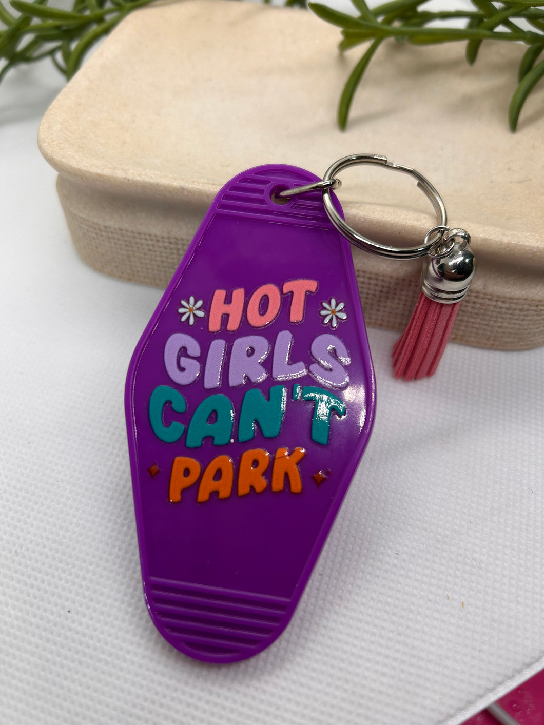 “Hot girls can’t park” motel style keychain