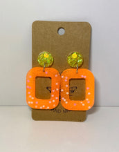 Load image into Gallery viewer, Neons yellow and orange star squoval stud dangles- black light reactive
