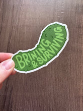 Load image into Gallery viewer, Brining and Surviving Pickle Sticker
