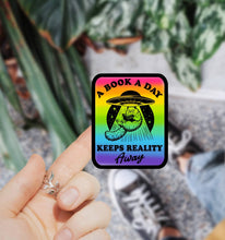 Load image into Gallery viewer, A Book a Day Keeps Reality Away Bookish Sticker
