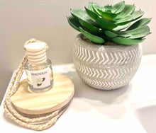 Load image into Gallery viewer, Magnolia car diffuser
