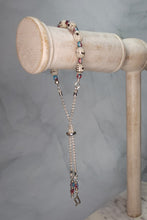 Load image into Gallery viewer, Sheet Music Slider Knot Paper Bead Bracelet w/ pink/blue glass spacer beads &amp; silver music note charm
