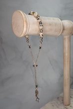 Load image into Gallery viewer, Sheet Music Slider Knot Paper Bead Bracelet w/ silver glass spacer beads &amp; silver music note charm
