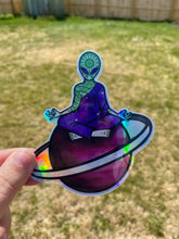 Load image into Gallery viewer, Holographic Meditating Alien Planet Sticker
